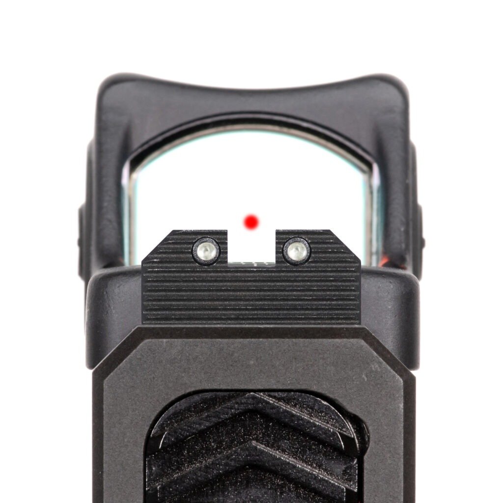 night fision optics ready height sights on a pistol with a red dot